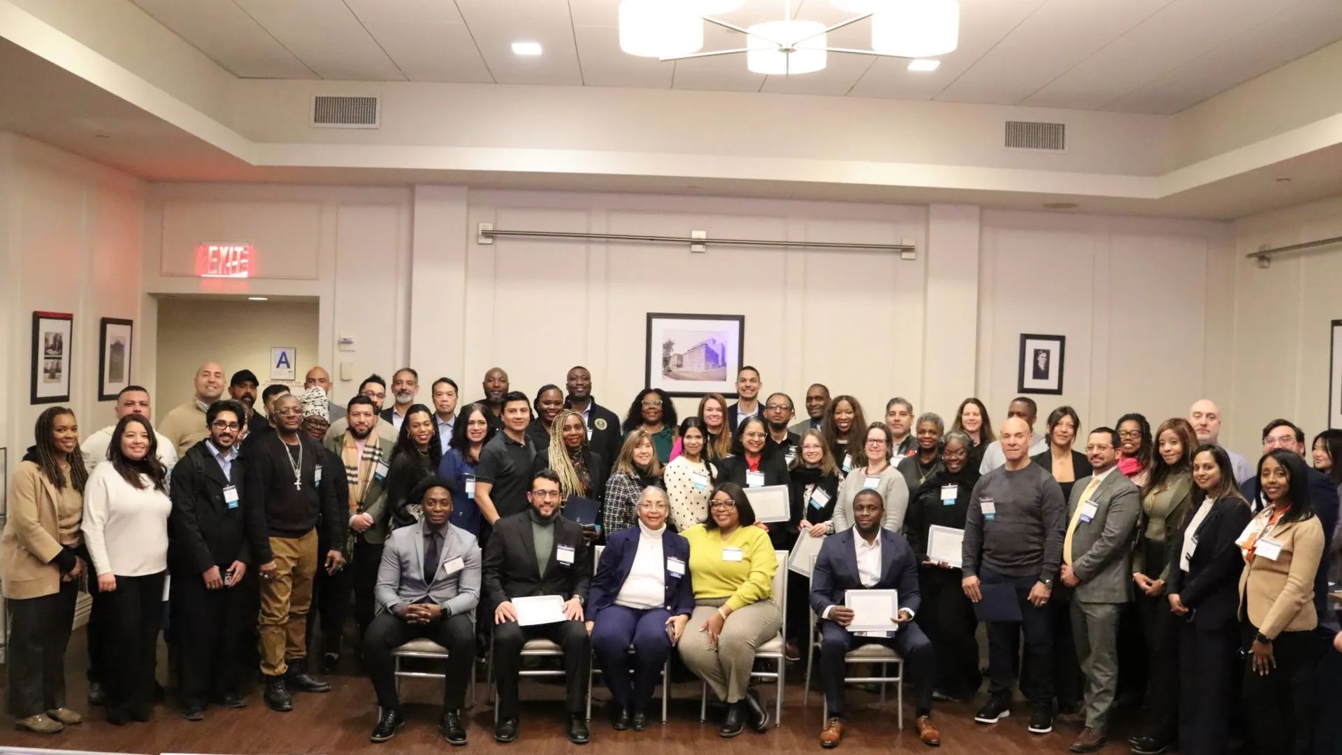 Graduates of CU Grow Cohort Nine, their mentors, and program staff gathered for a photo after the graduation ceremony.