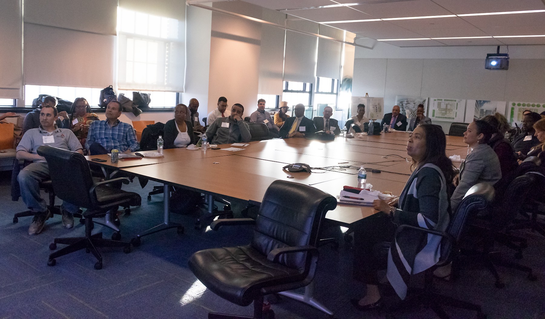 CU Grow participants and coaches listen attentively as they hear the next steps from the Facilities & Operations Construction Business Initiatives team.