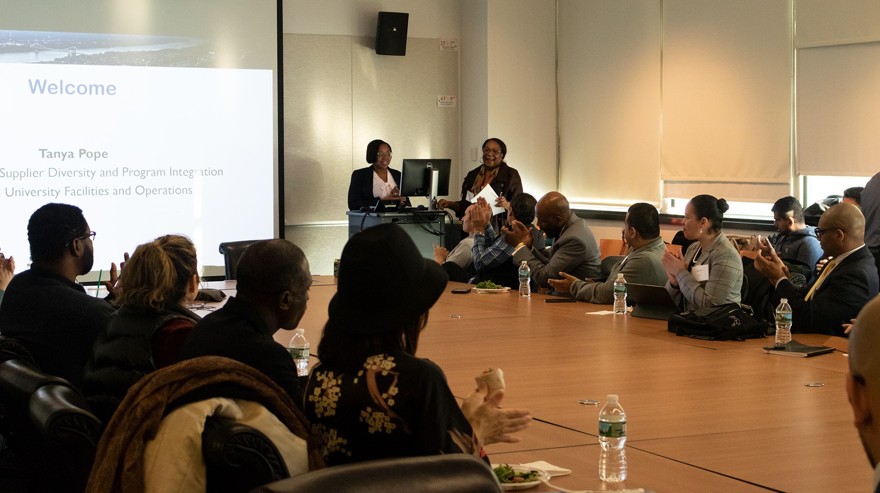 CU Grow leaders Scharlene de la Cruz, Program Administrator, left, and Tanya Pope, AVP for University Supplier Diversity and Program Integration, welcome the 2019 cohort of small business owners and their coaches to the program’s third year.