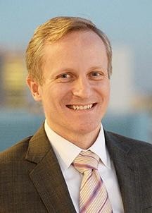A headshot of David M. Greenberg, Executive Vice President
